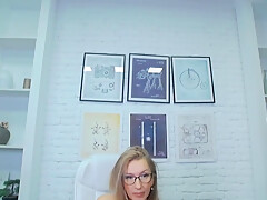 Mature boss is masturbating in her office
